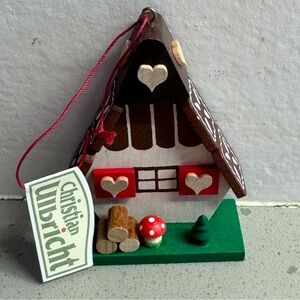 This is a Christian Ulbricht gingerbread house ornament.